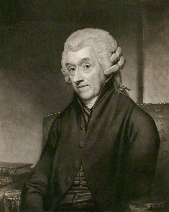 Pintura antiga e em preto e branco do médico inglês William Heberden. Ele está sentado em uma cadeira ao lado de diversos livros e usa uma peruca de época.